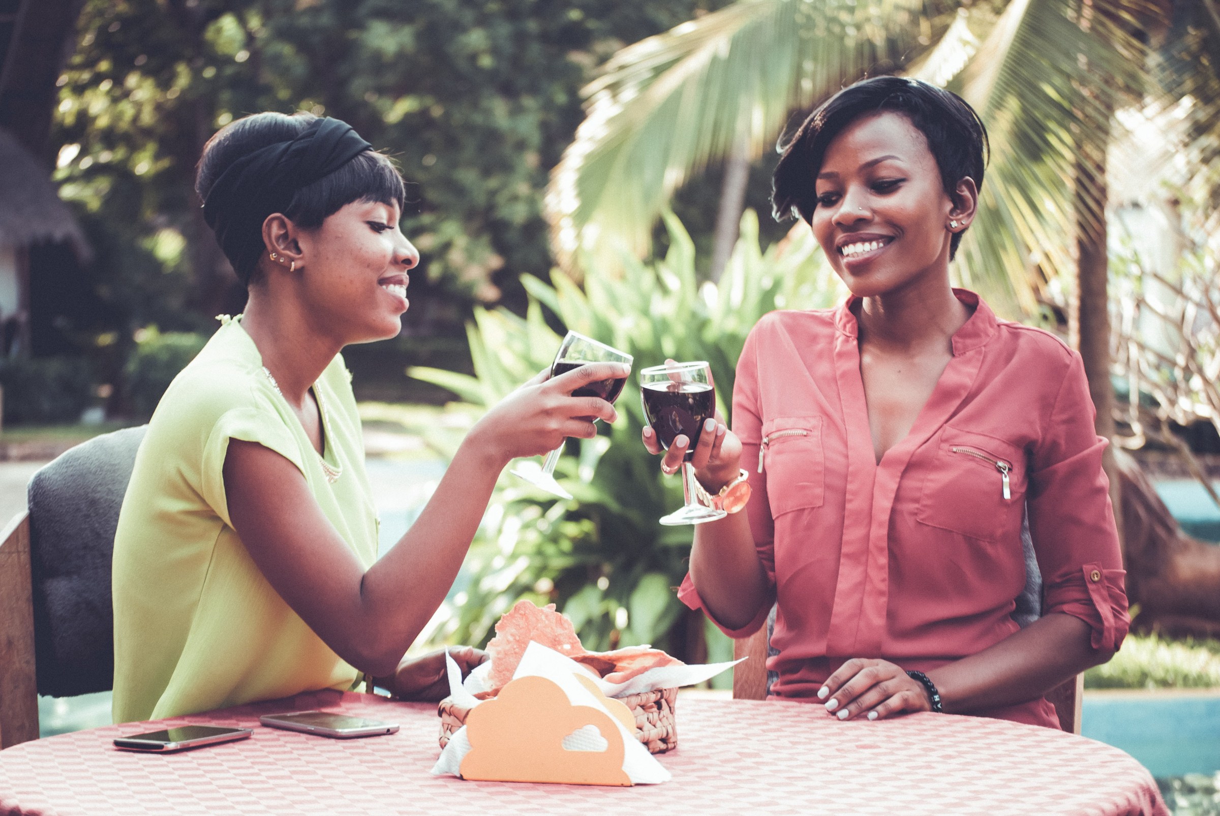 Women drink vine outside