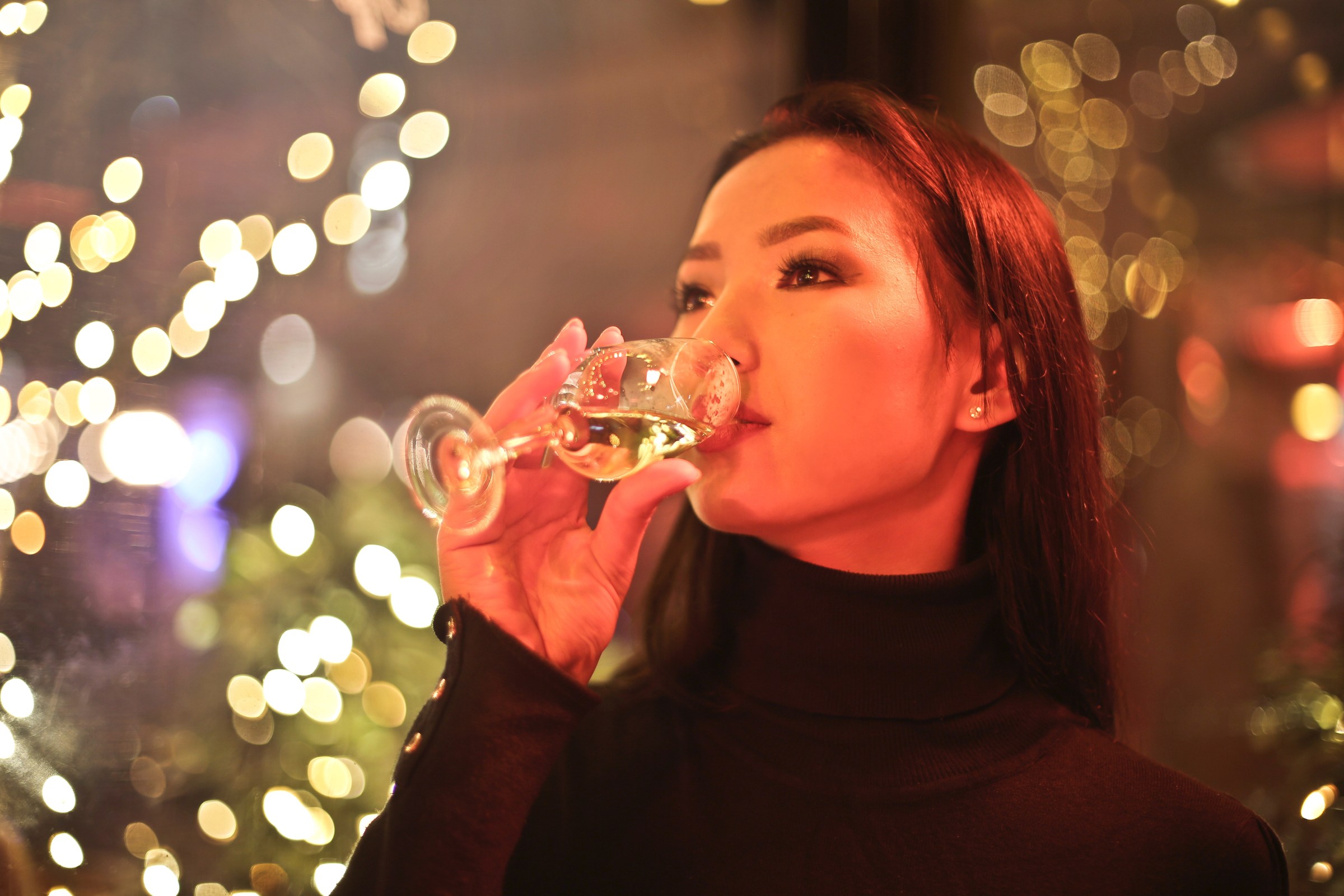 Woman drinking vine